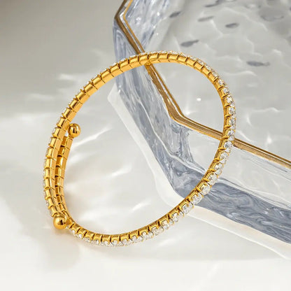 Alvora Aureline Gold Spiral Bangle – Radiant 18K Elegance Jewelry