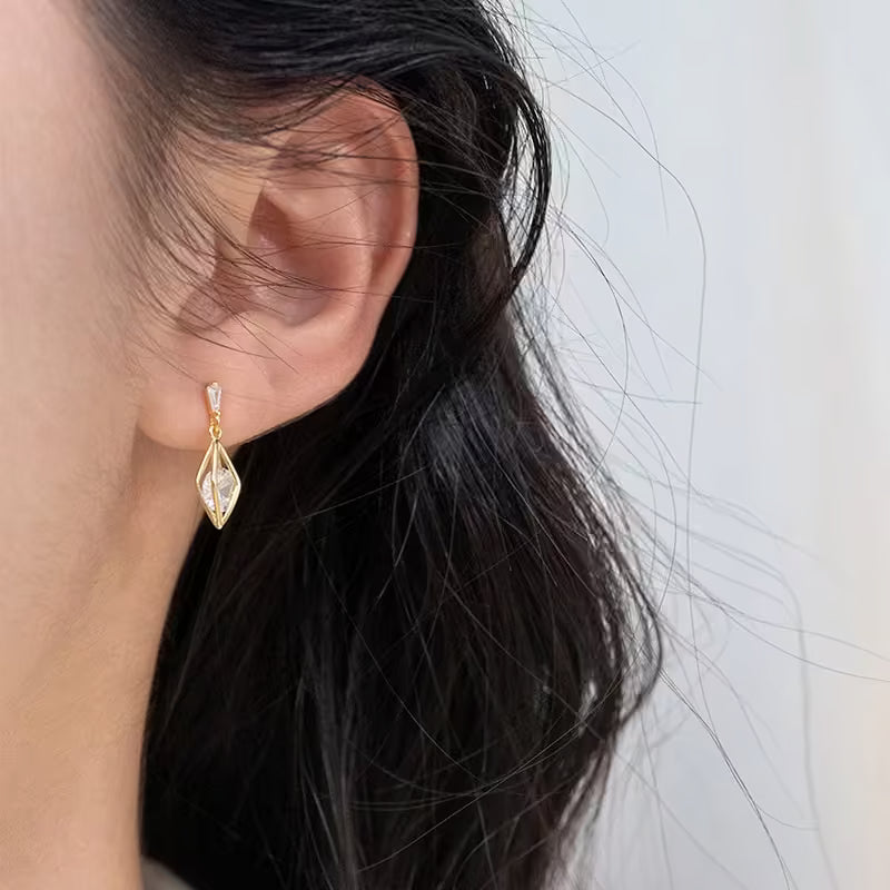 Vespera - Alvora #18KGoldPlated #GeometricJewelry #GoldDropEarrings