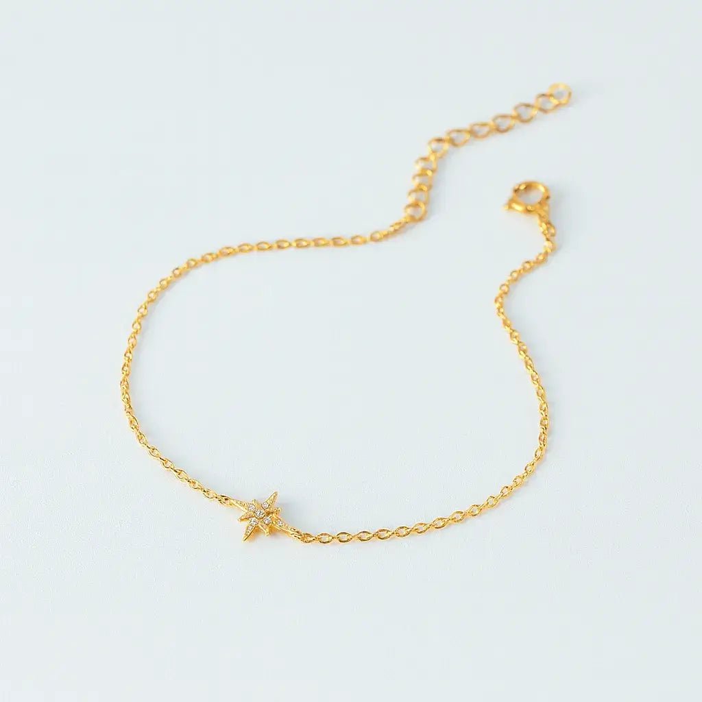 Gold bracelet with a star charm, minimal design