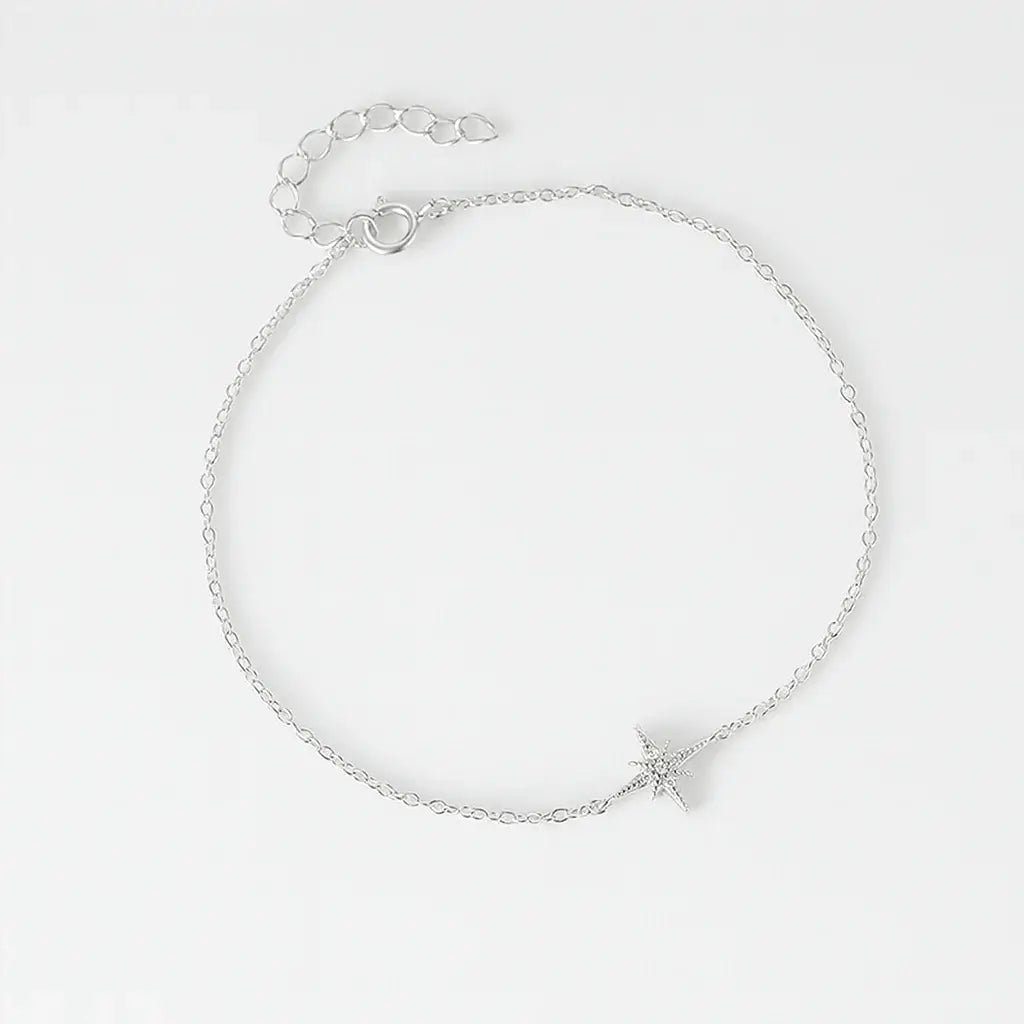 Silver bracelet with a star charm, minimal design