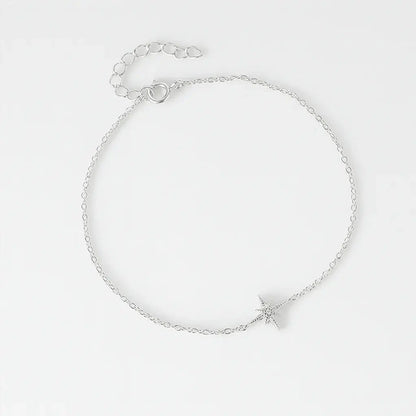 Silver bracelet with a star charm, minimal design